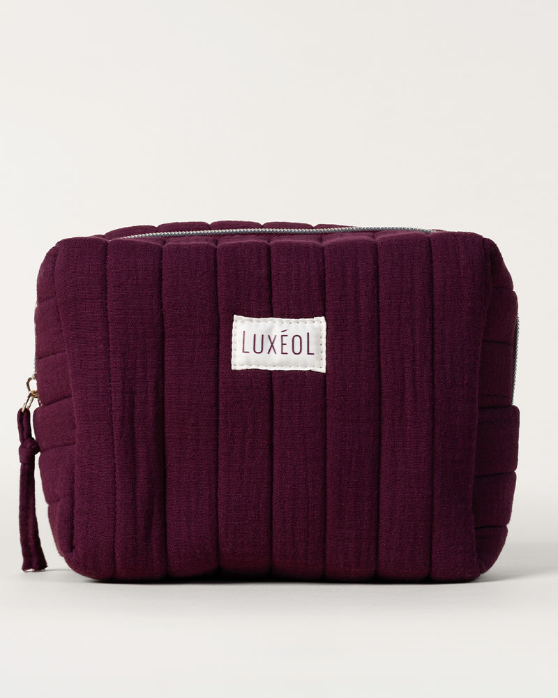 Trousse matelassée violette