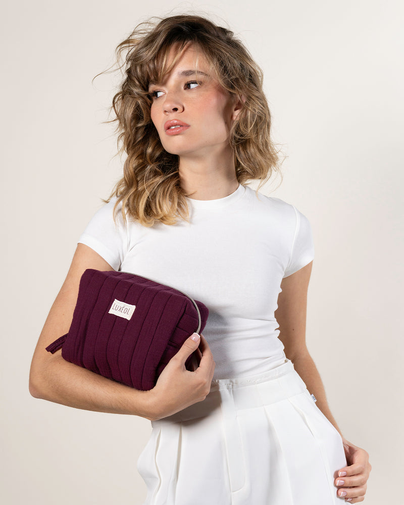 Trousse matelassée violette